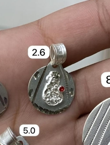 Dijes de plata