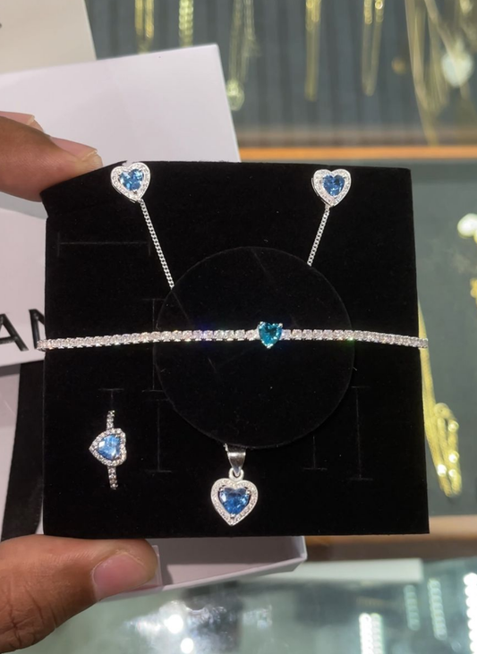 Sets de cadena, guillo, arete y anillo