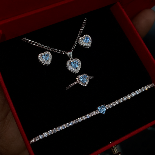 Sets Azul celeste completo con caja roja de cadena, arete, guillo y anillo Modelo 44