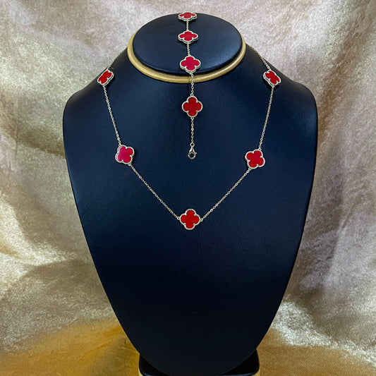 Cadena y guillo de trebol con baño de oro rojo