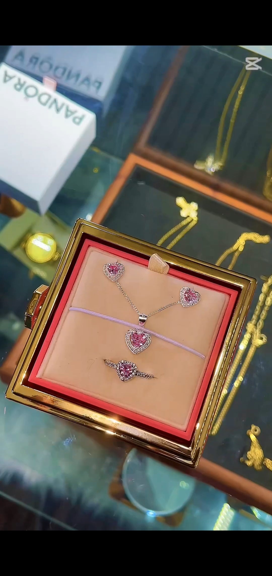 Sets rosado de cadena, arete y anillo