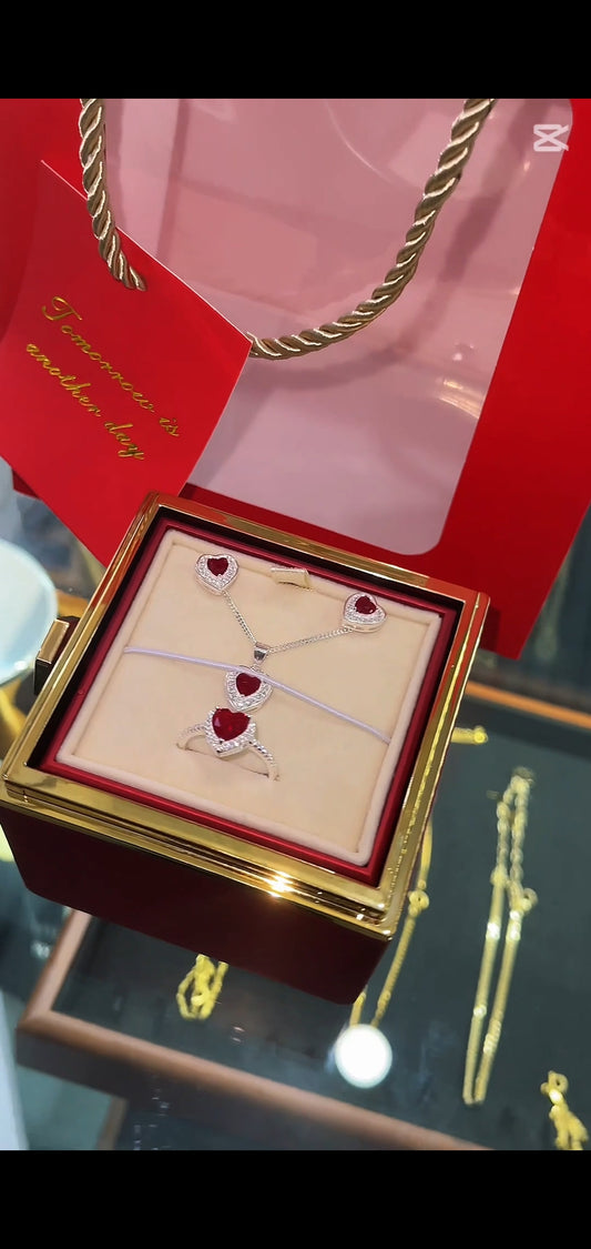 Sets rojo de cadena, arete y anillo